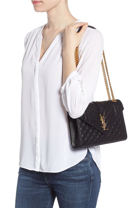 ysl medium cassandra calfskin shoulder bag|Whats In My Bag: YSL Medium Cassandra Calfskin Shoulder Bag.